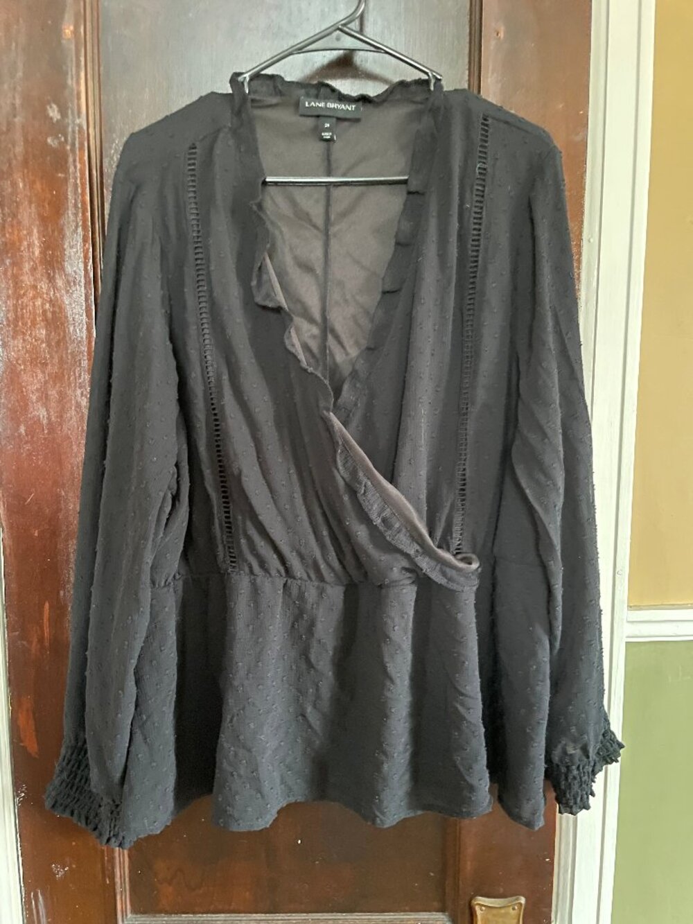 Swiss dot sheer peplum wrap blouse